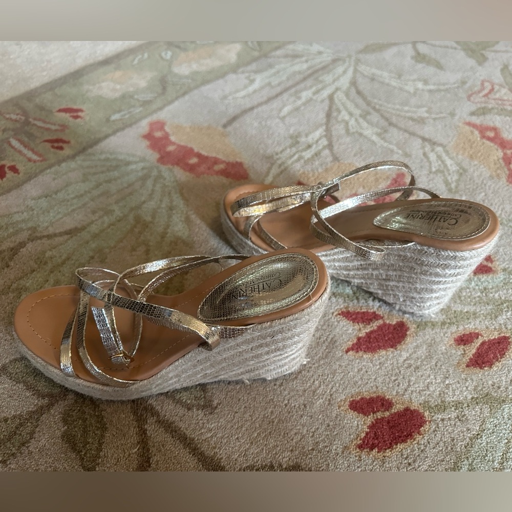 Pretty gold strappy sandals.